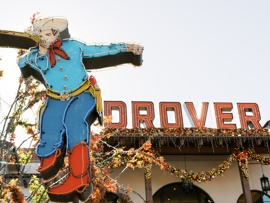 Iconic Hotel Drover exterior and neon cowboy sign