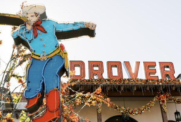 Iconic Hotel Drover exterior and neon cowboy sign