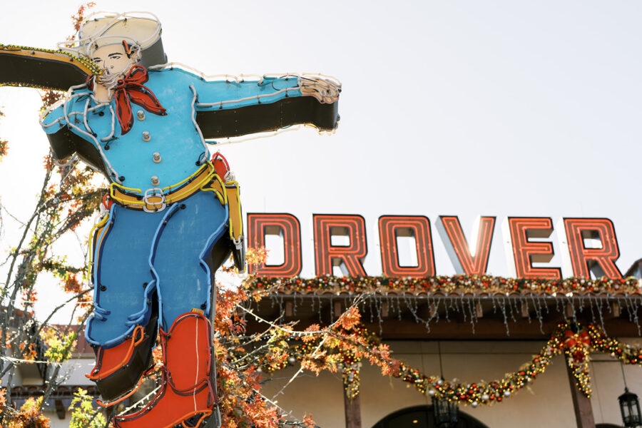 Iconic Hotel Drover exterior and neon cowboy sign