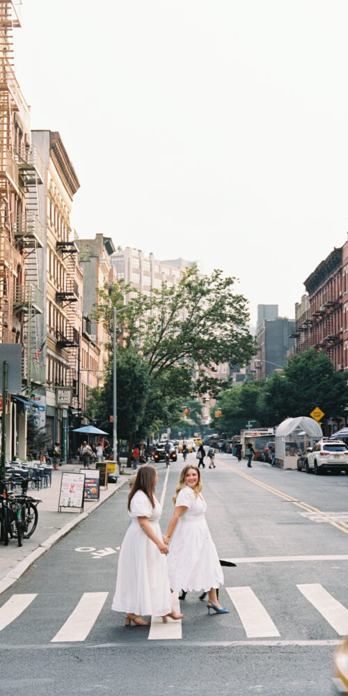 Two brides cross the street for their Cincinnati wedding