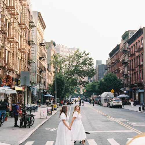 Two brides cross the street for their Cincinnati wedding